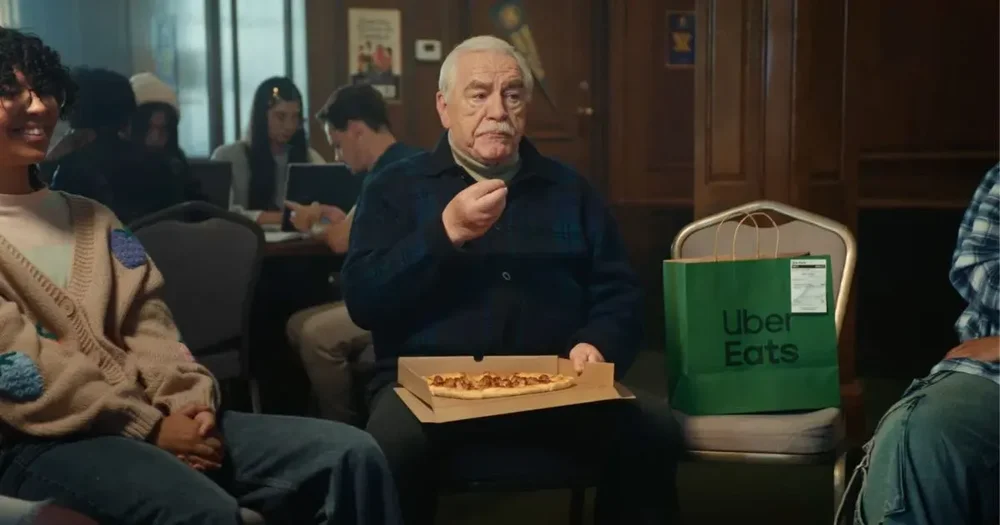 Body image for Uber Eats features Brian Cox as a college ‘freshman’ in campaign to promote Uber One student perks